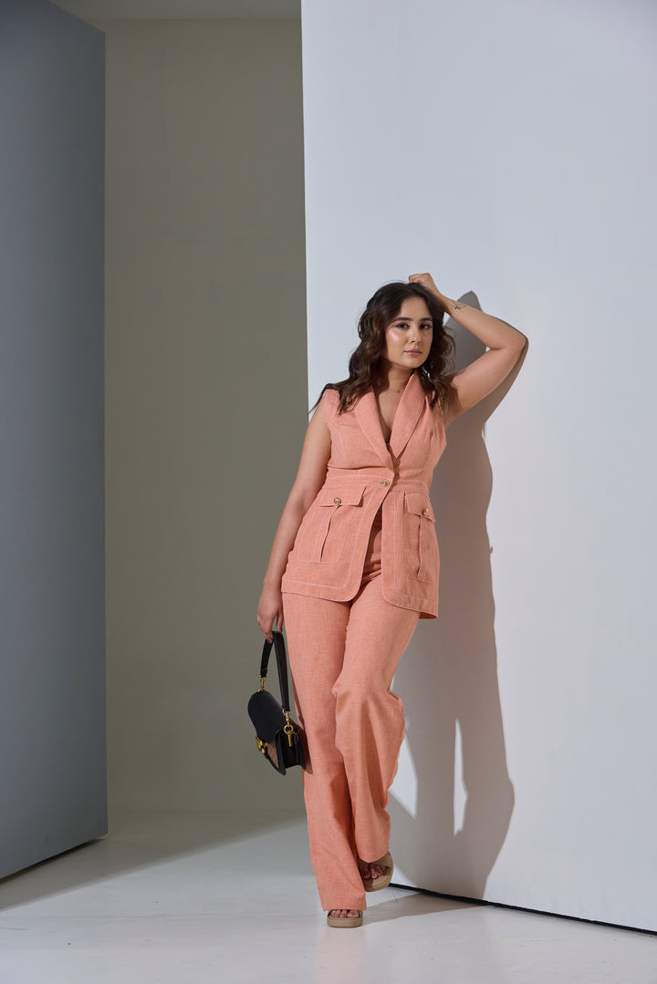 Model wearing Sleeveless Top stitch Waist Coat with Pants