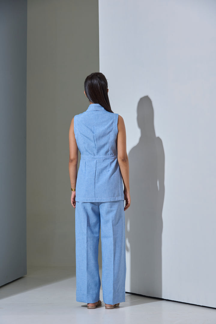 Model wearing Sleeveless Top stitch Waist Coat with Pants