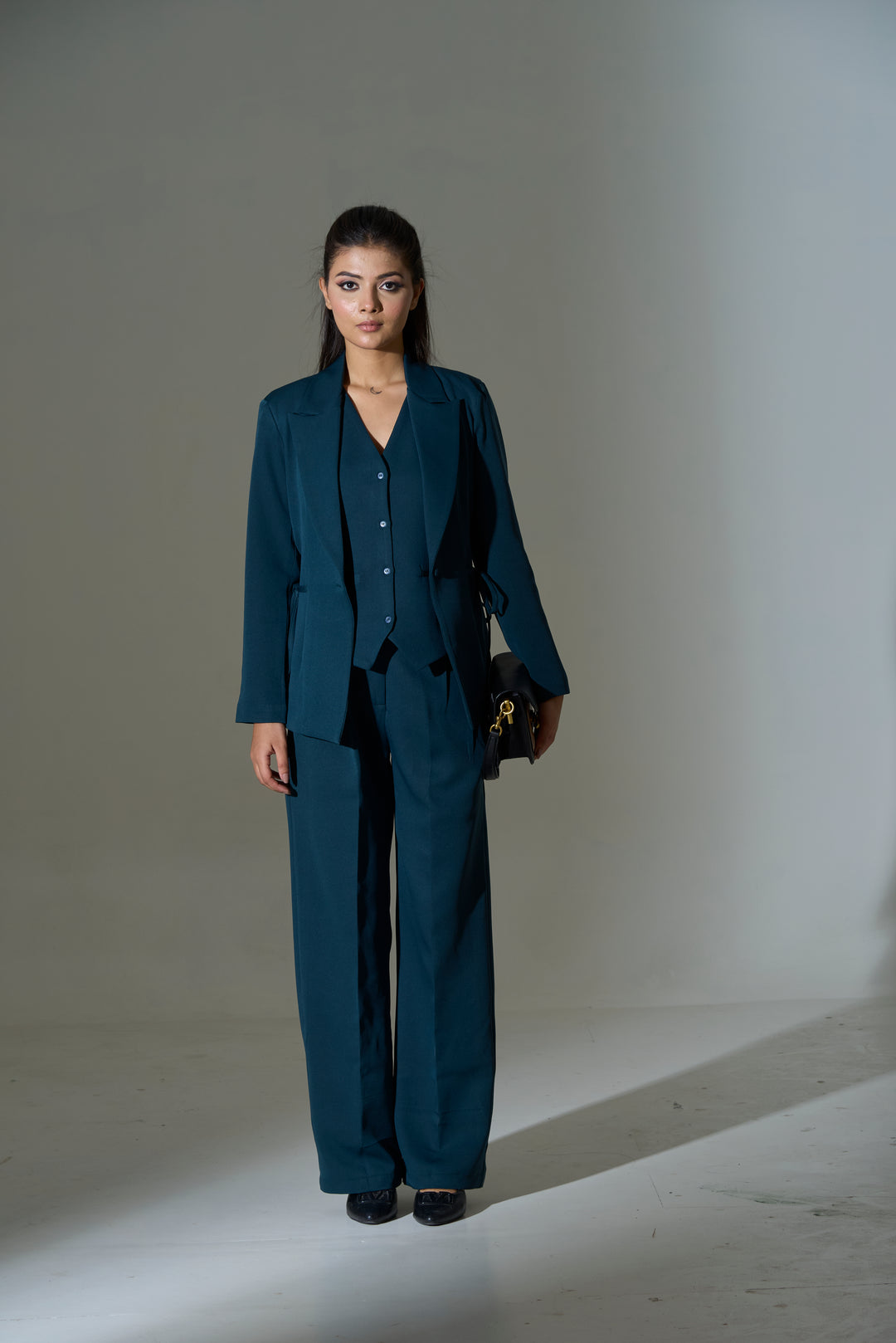 Model wearing 3 piece set(Blazer, Waist coat and Pants)

