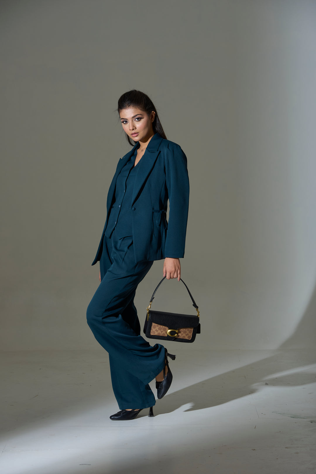 Model wearing 3 piece set(Blazer, Waist coat and Pants)
