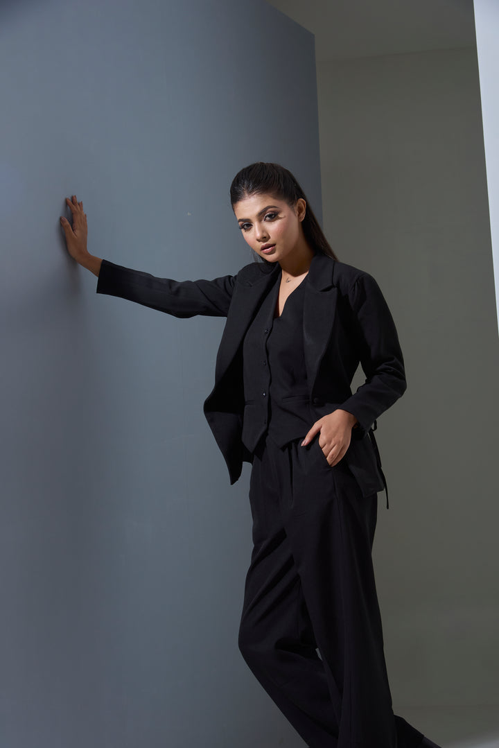 Model wearing 3 piece set(Blazer, Waist coat and Pants)