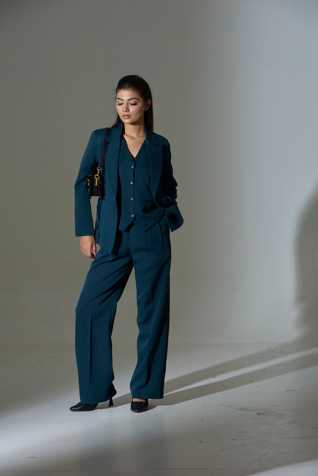 Model wearing 3 piece set(Blazer, Waist coat and Pants)
