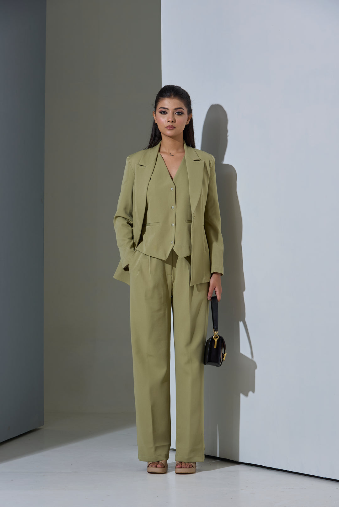 Model wearing 3 piece set(Blazer, Waist coat and Pants)
