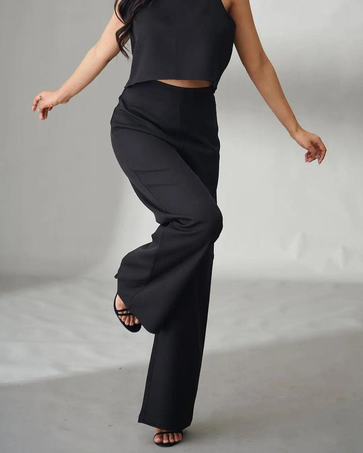 Stylish black co-ord set for women featuring a cropped top and high-waisted pants