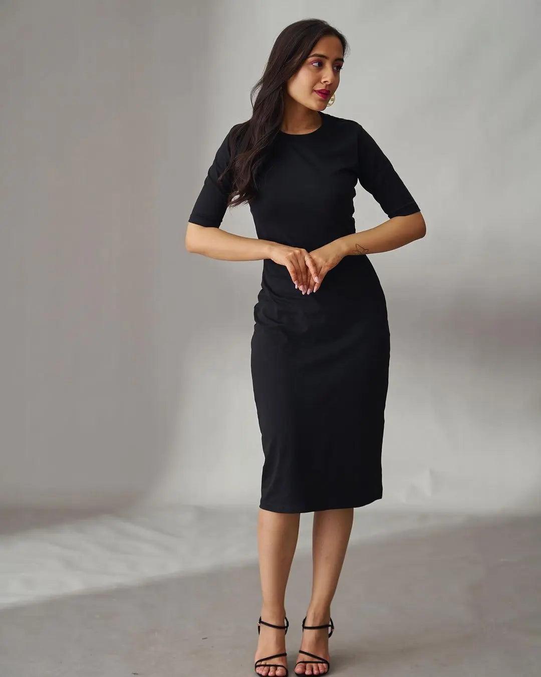 Risate black midi bodycon dress with short sleeves, perfect for elegant occasions