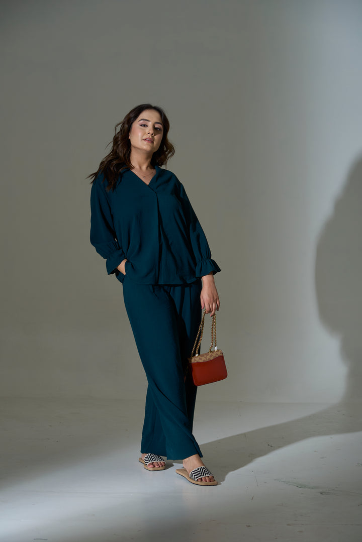 Elegant burnt orange crepe coord set featuring a stylish top and matching pants for a chic look
