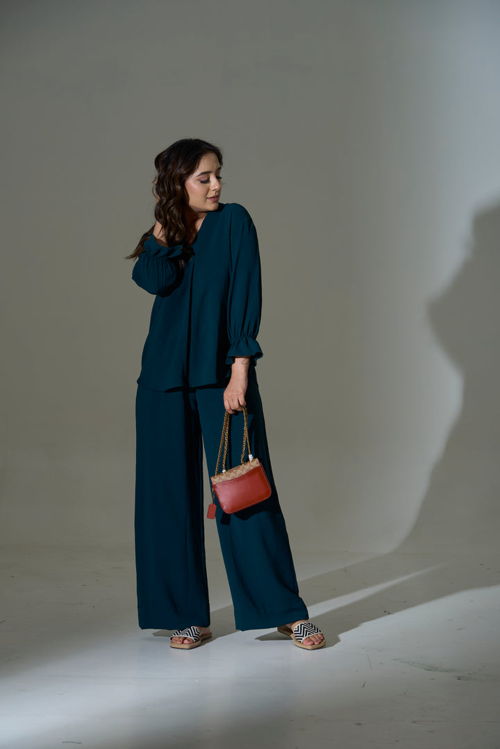 Burnt orange crepe coord set featuring a relaxed fit top and wide-leg pants for a stylish look