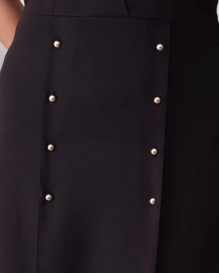 Close-up of the Risate Caroline wrap dress for women featuring elegant pearl-button detailing