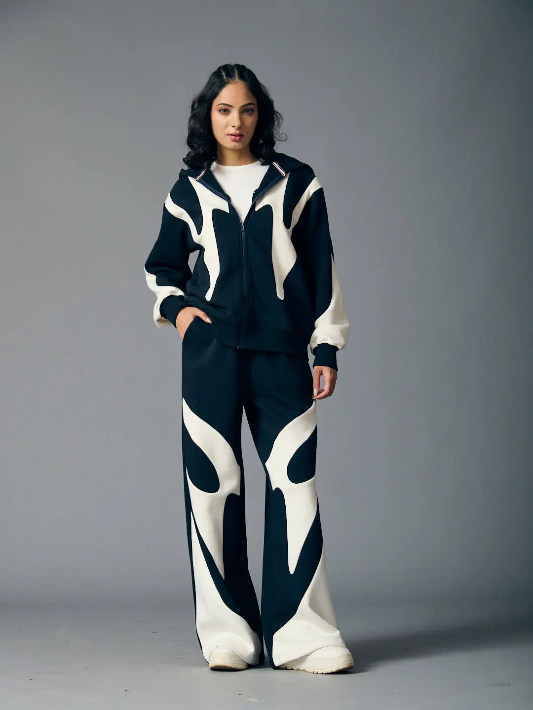 Risate chic streetwear set for women featuring a stylish oversized jacket and wide-leg pants