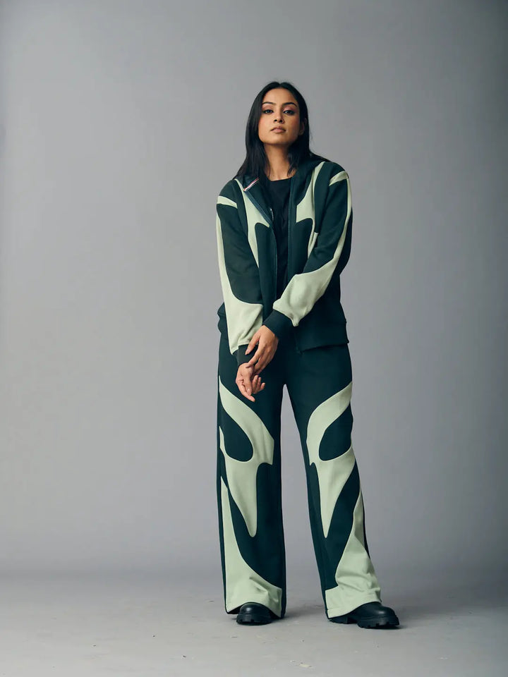 Risate chic streetwear set for women featuring patterned top and wide-leg pants in dark green and mint