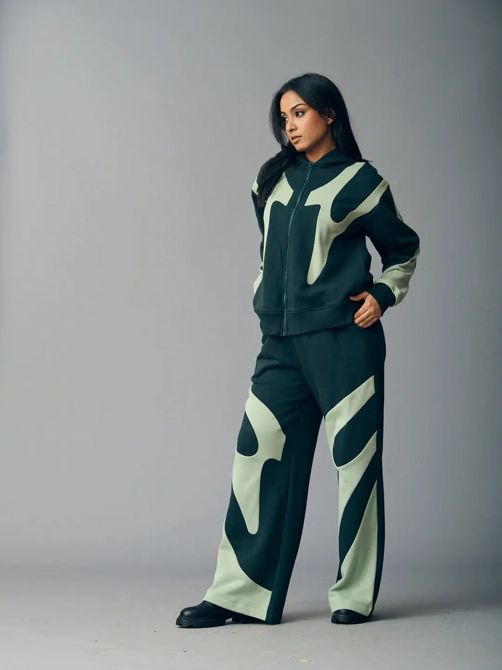 Risate chic streetwear set for women featuring a stylish black and green graphic design and relaxed fit