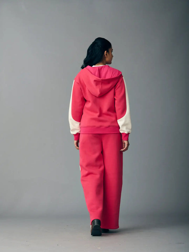 Risate chic streetwear set for women featuring a pink hooded top and matching wide-leg pants