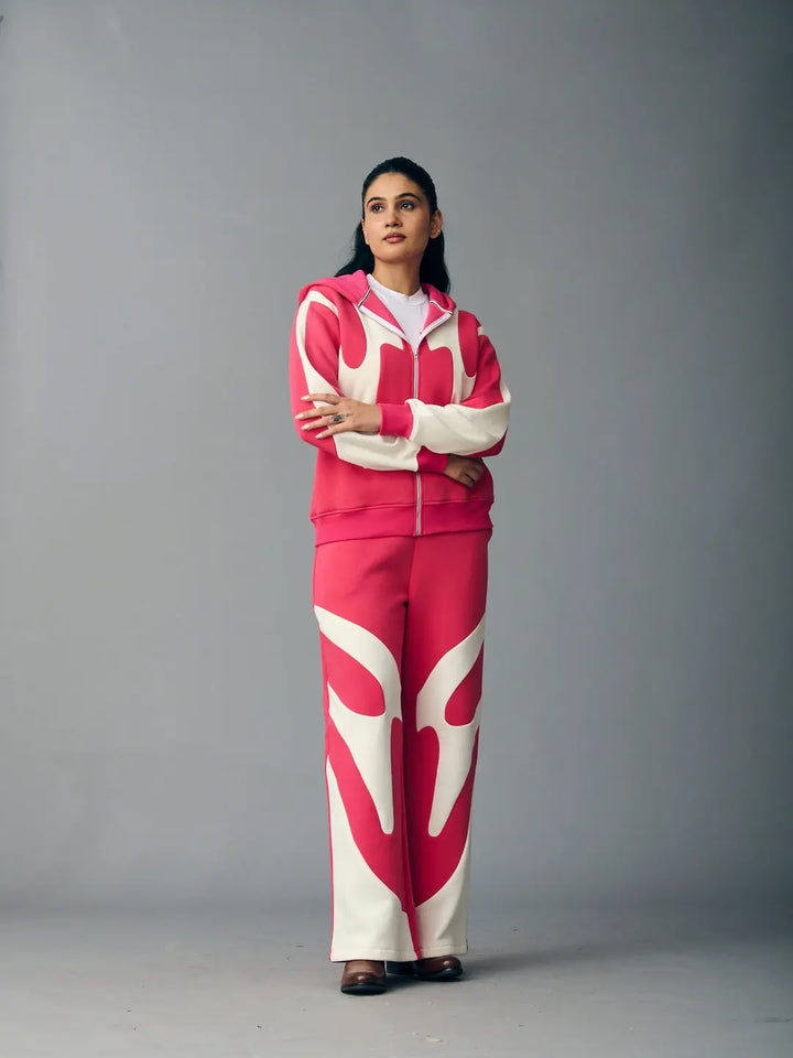 Risate chic streetwear set for women featuring a stylish pink and white hoodie and matching pants