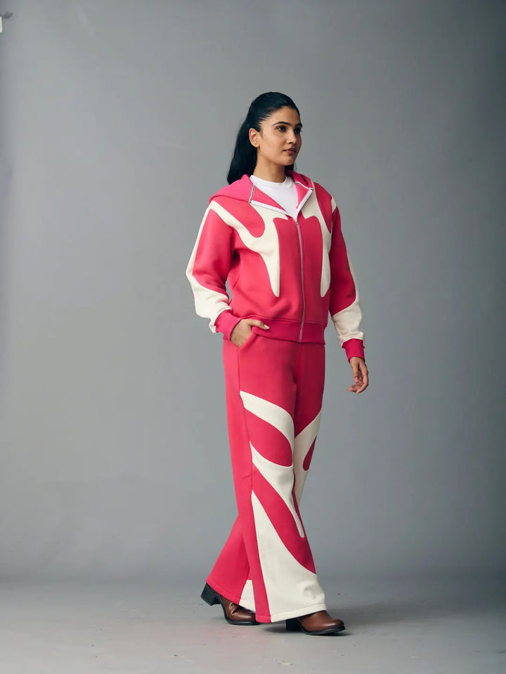 Trendy Risate chic streetwear set for women in pink and white with a stylish jacket and matching pants