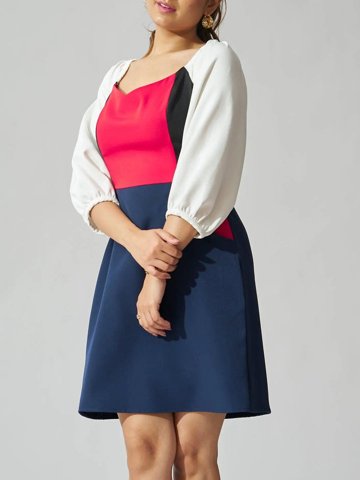 Risate colorblock mini dress for women with puff sleeves and a flattering fit for casual occasions