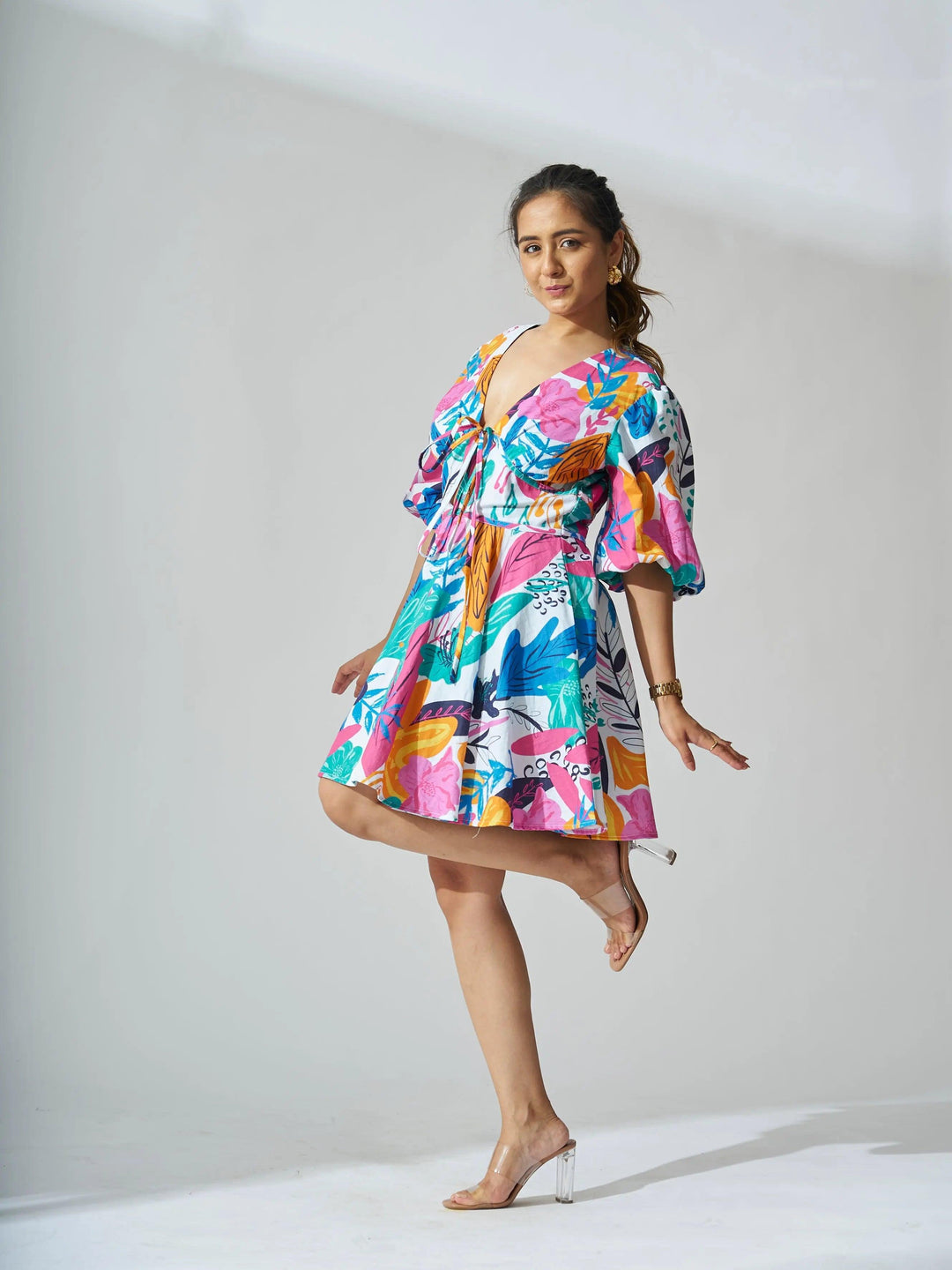 Risate coral reef linen dress with vibrant prints and puff sleeves for a fun summer look
