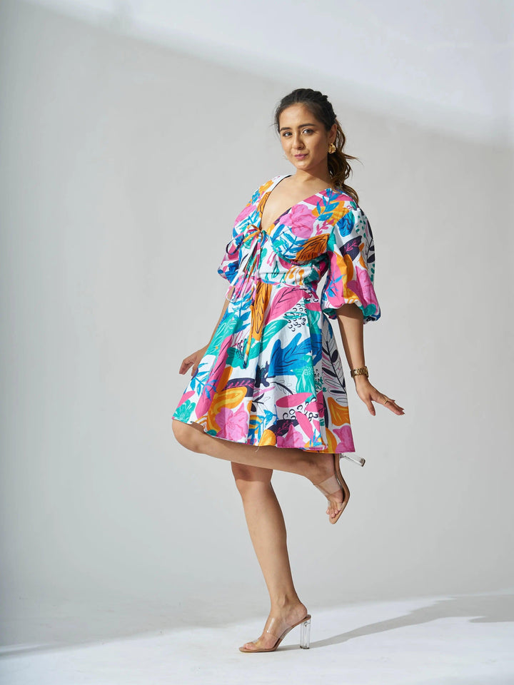 Risate coral reef linen dress with vibrant prints and puff sleeves for a fun summer look