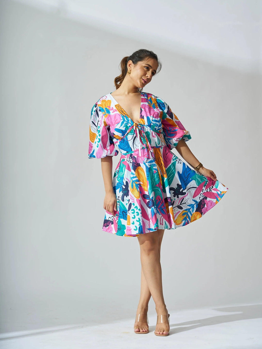 Risate coral reef linen dress featuring vibrant tropical prints and a flattering silhouette for summer styling