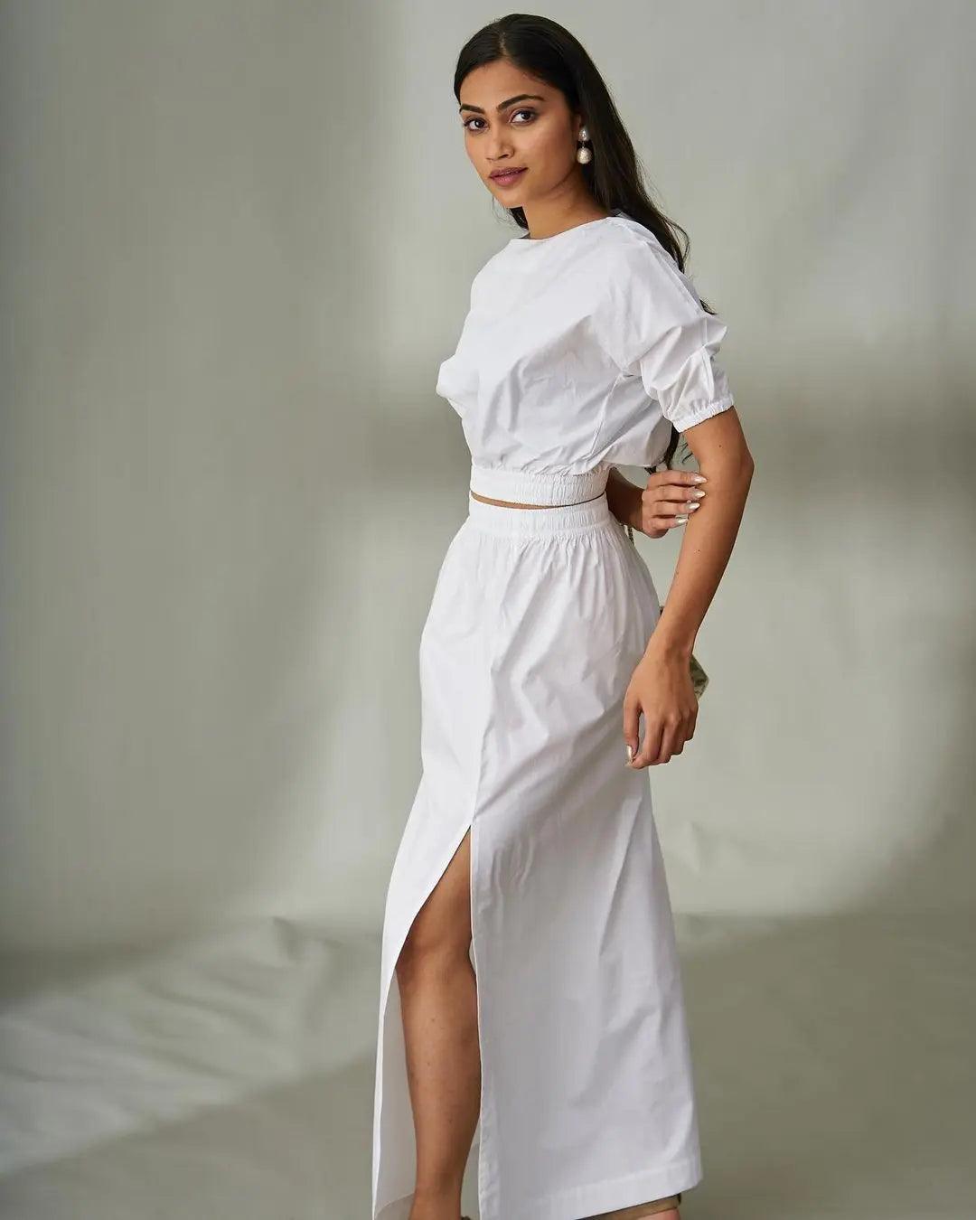Elegant Risate cotton poplin co-ord set for women in white featuring a cropped top and high-slit skirt