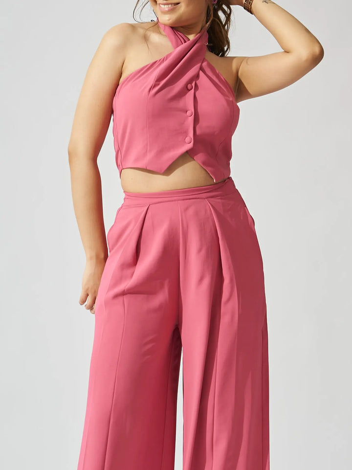 Risate cross neck cropped waistcoat set in pink featuring wide-leg trousers and a stylish halter top