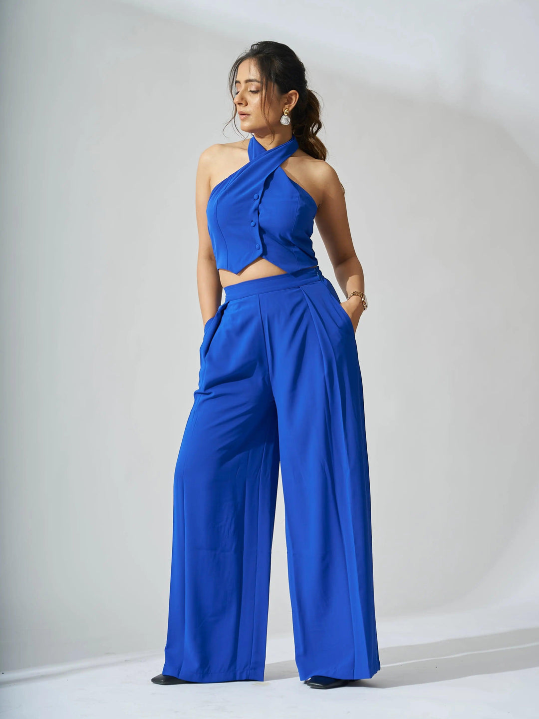 Risate cross neck cropped waistcoat set in vibrant blue with wide-leg pants for a stylish look