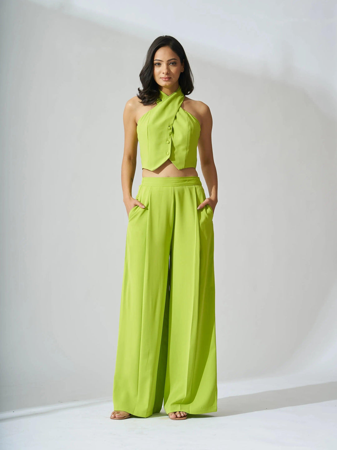 Risate cross neck cropped waistcoat set in vibrant green with wide-leg pants for a stylish look