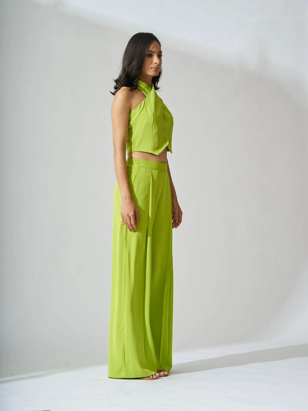 Risate cross neck cropped waistcoat set in vibrant green for a stylish summer look