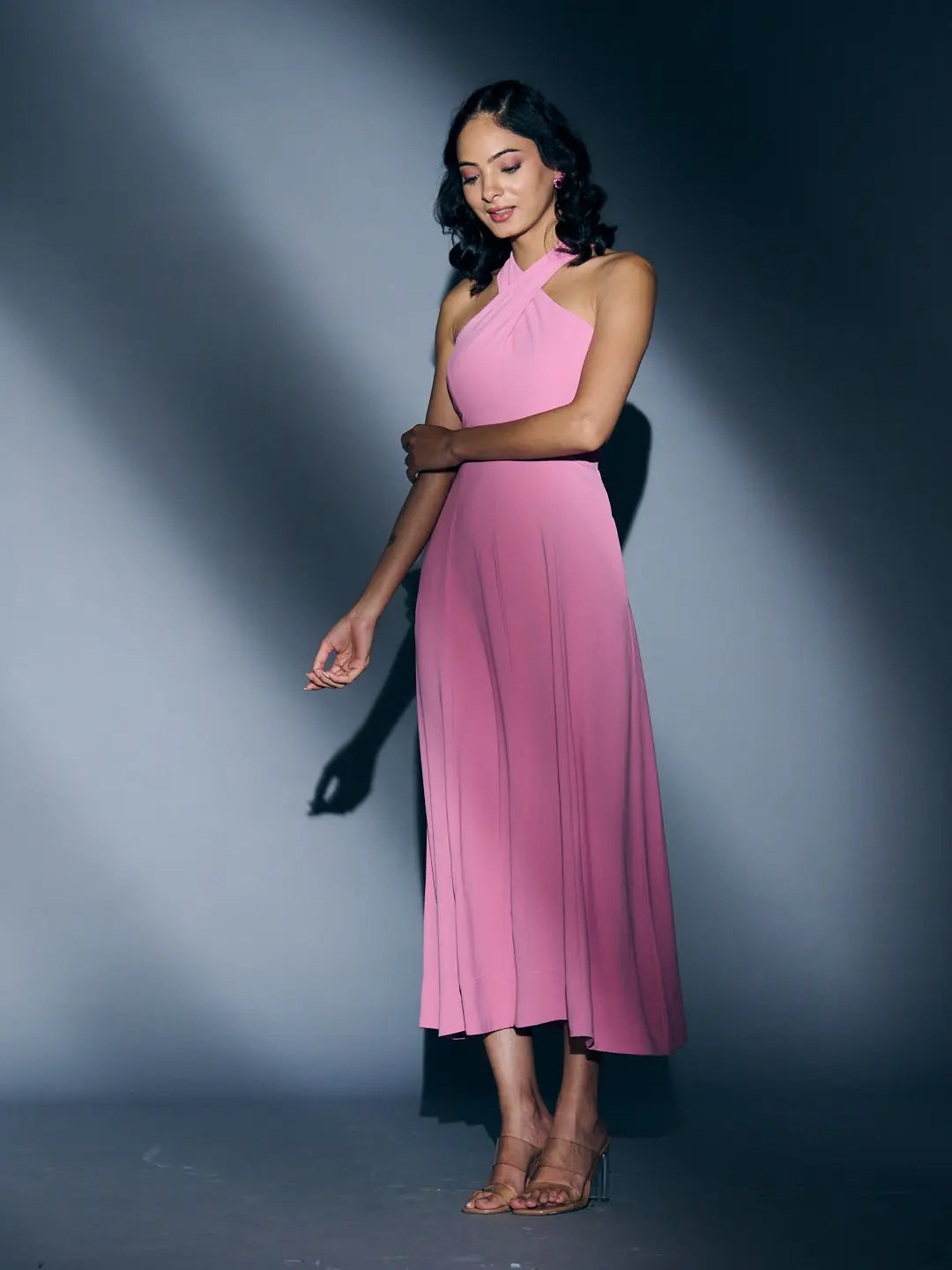 Risate crossneck crepe maxi dress in pink with a halter neck design and flowing skirt