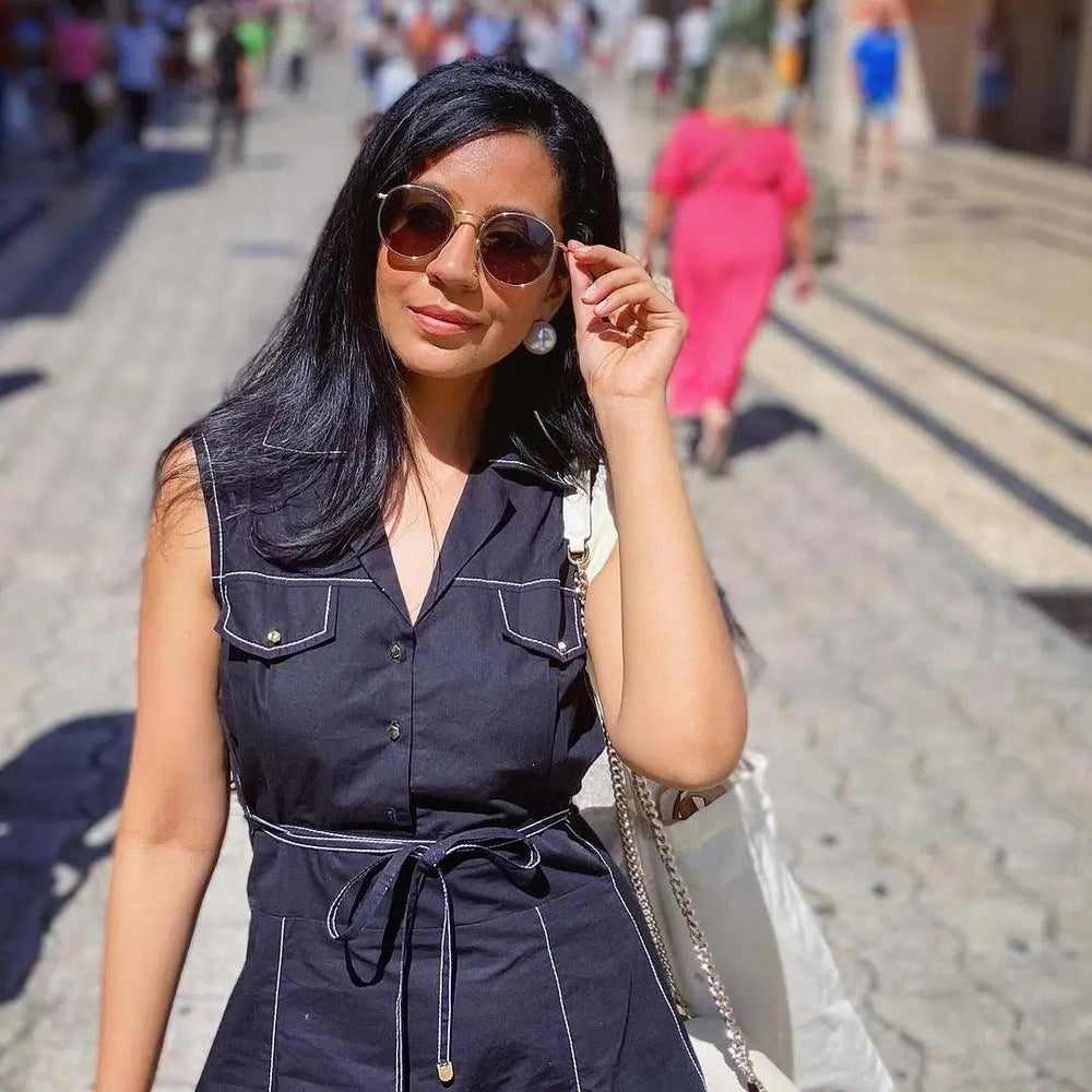 Risate elegant midi dress for women styled with sunglasses for a chic summer look