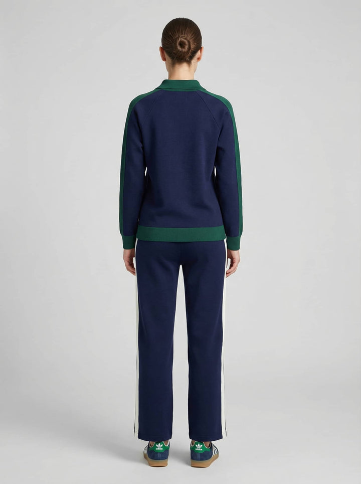 Back view of Risate emerald navy luxe trackset for women featuring a chic color-block design