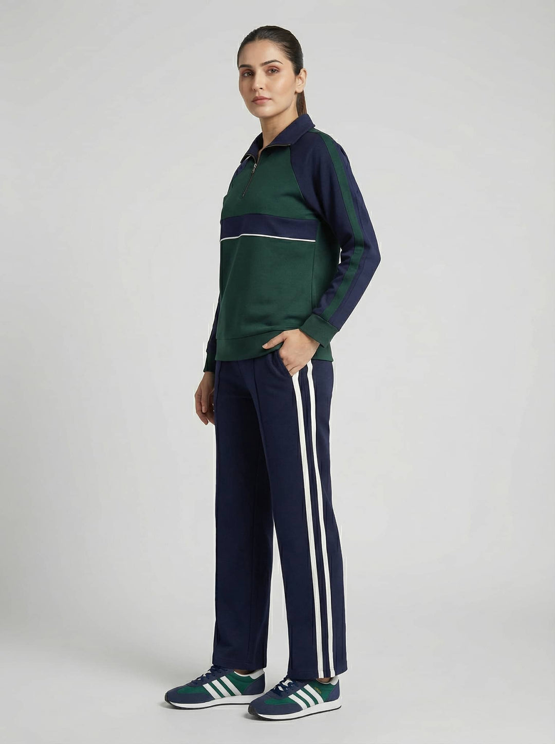 Emerald navy luxe trackset for women featuring a zip-up top and matching track pants