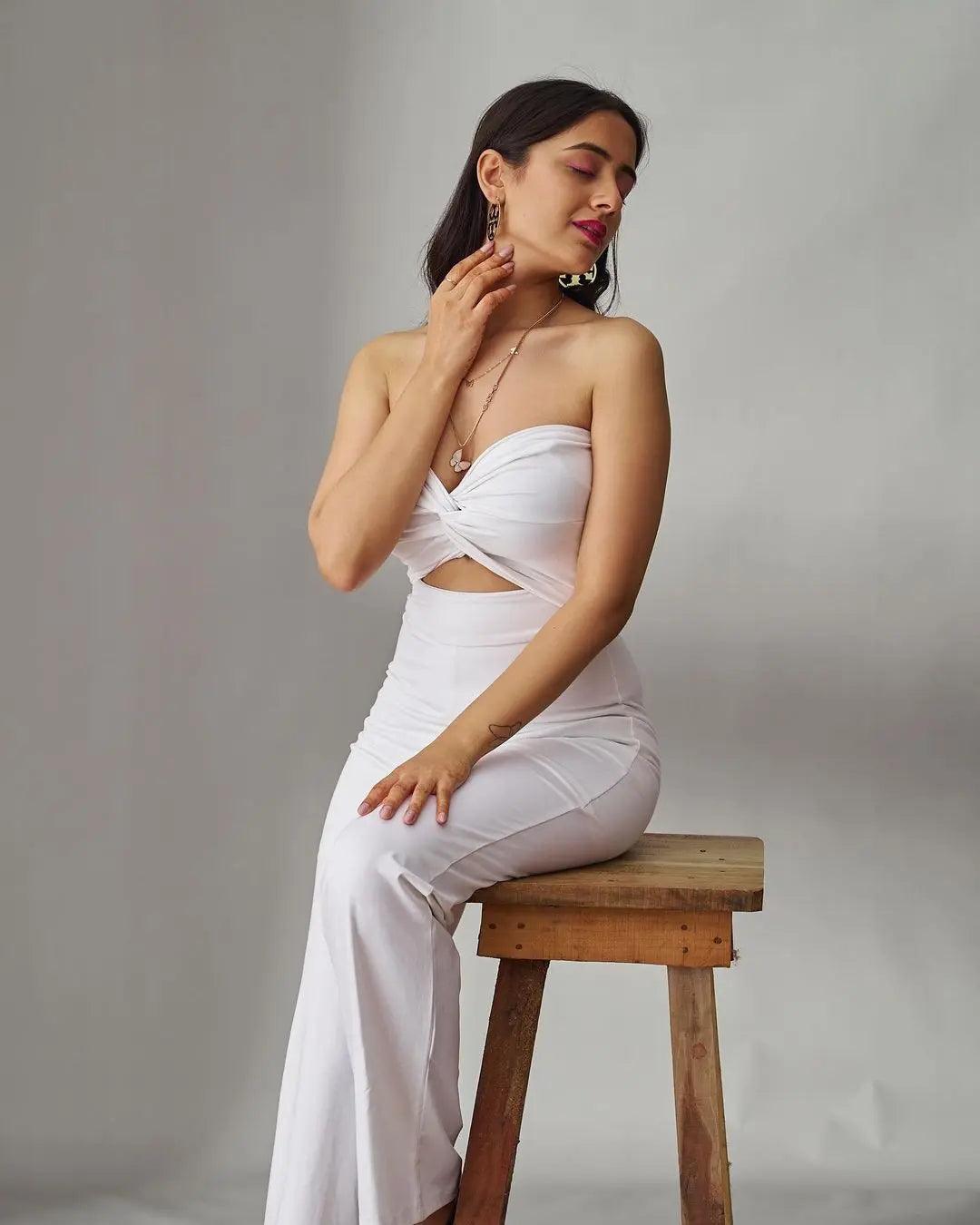 Risate front knot off shoulder jumpsuit in white with cutout design and elegant fit
