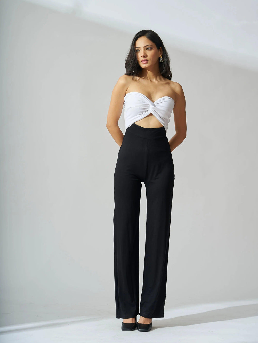 Elegant front knot off shoulder jumpsuit in black and white with a stylish design for a chic look
