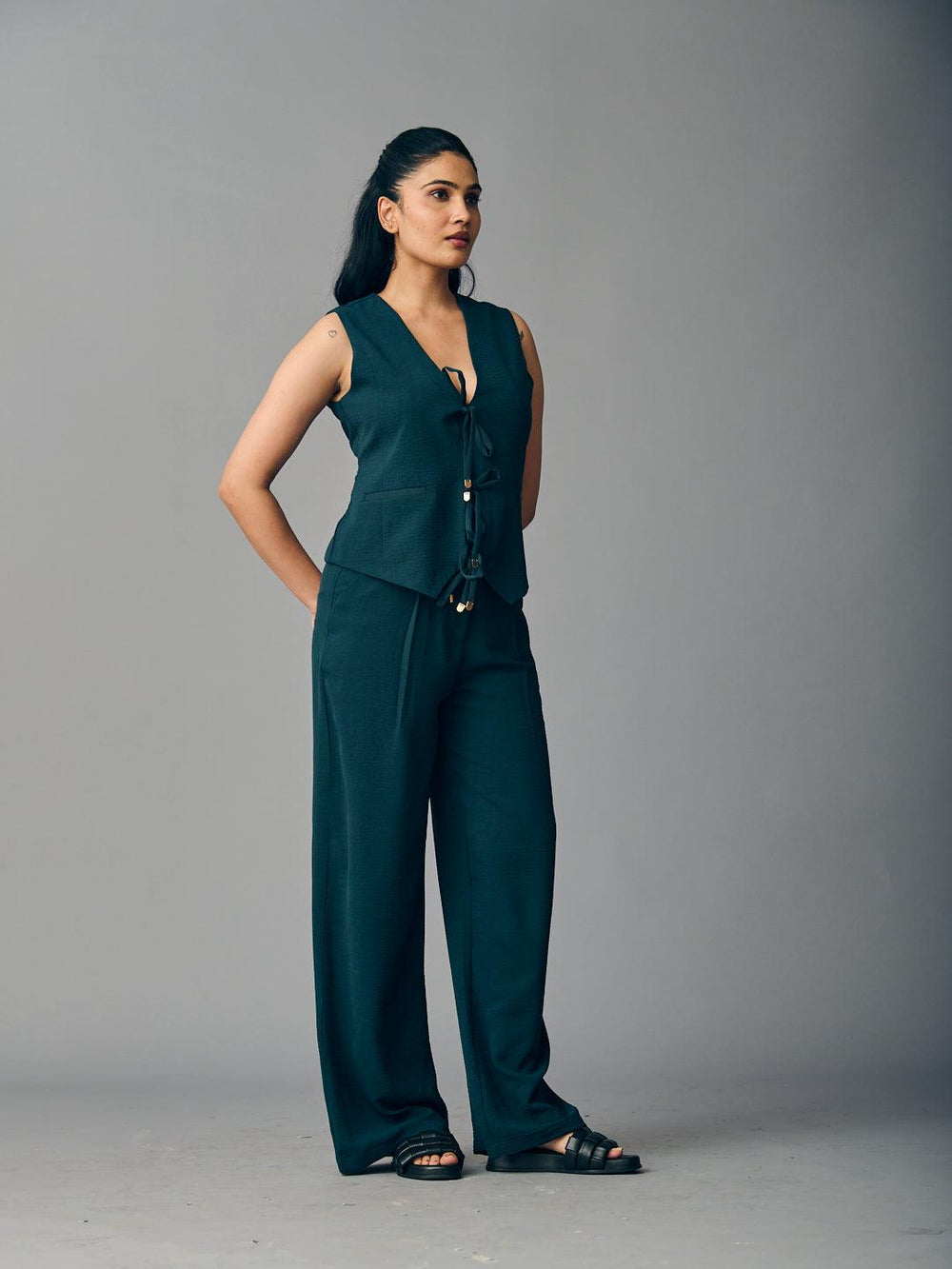 Risate front tie waist coat and pants set in dark green for a stylish and modern look.