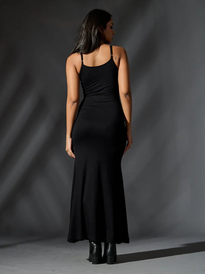 Back view of a sleek black glam maxi bodycon dress with thin adjustable straps