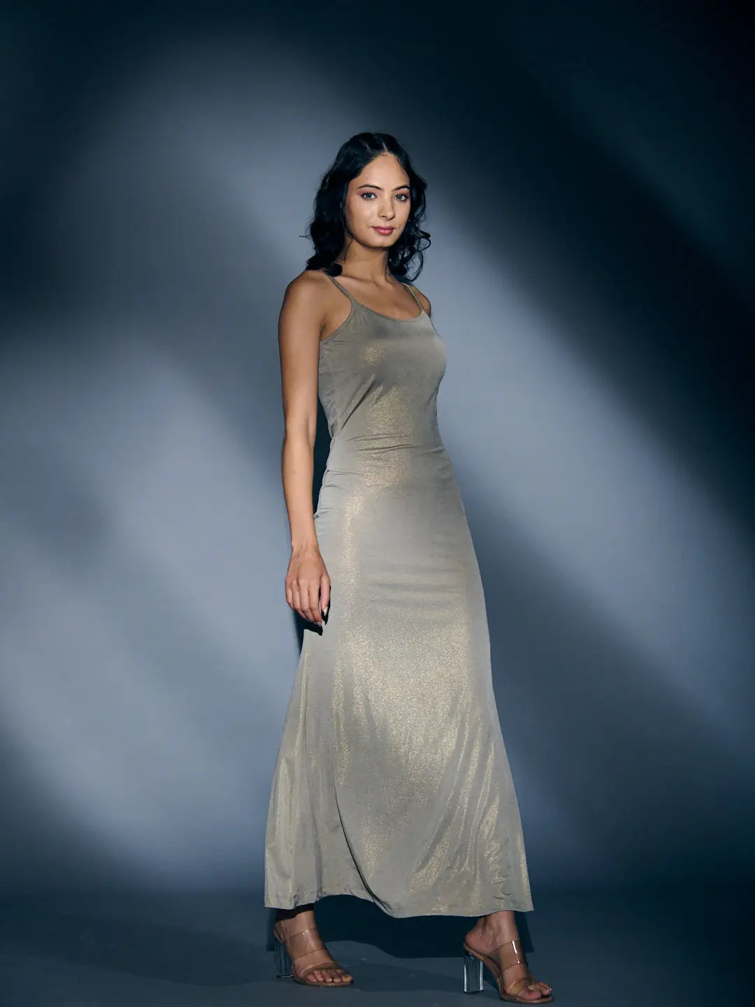 Risate glam maxi bodycon dress in shimmering gold with a sleek design perfect for elegant occasions