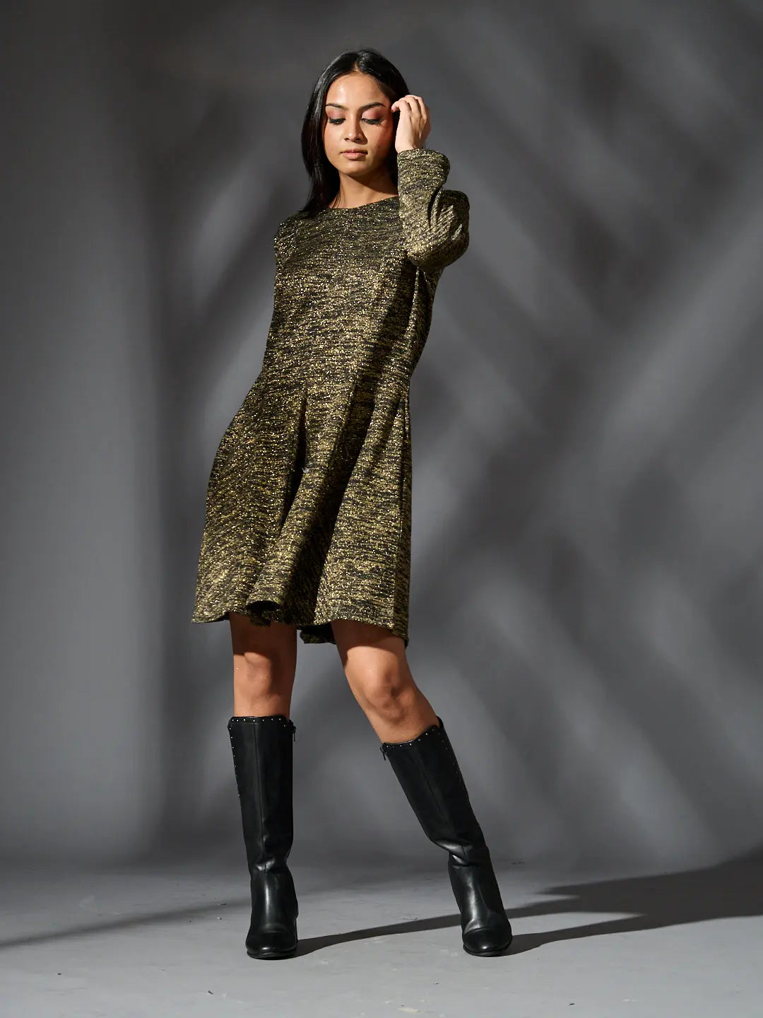 Risate golden knit glam dress with a stylish cut, perfect for fashionable outings and special occasions