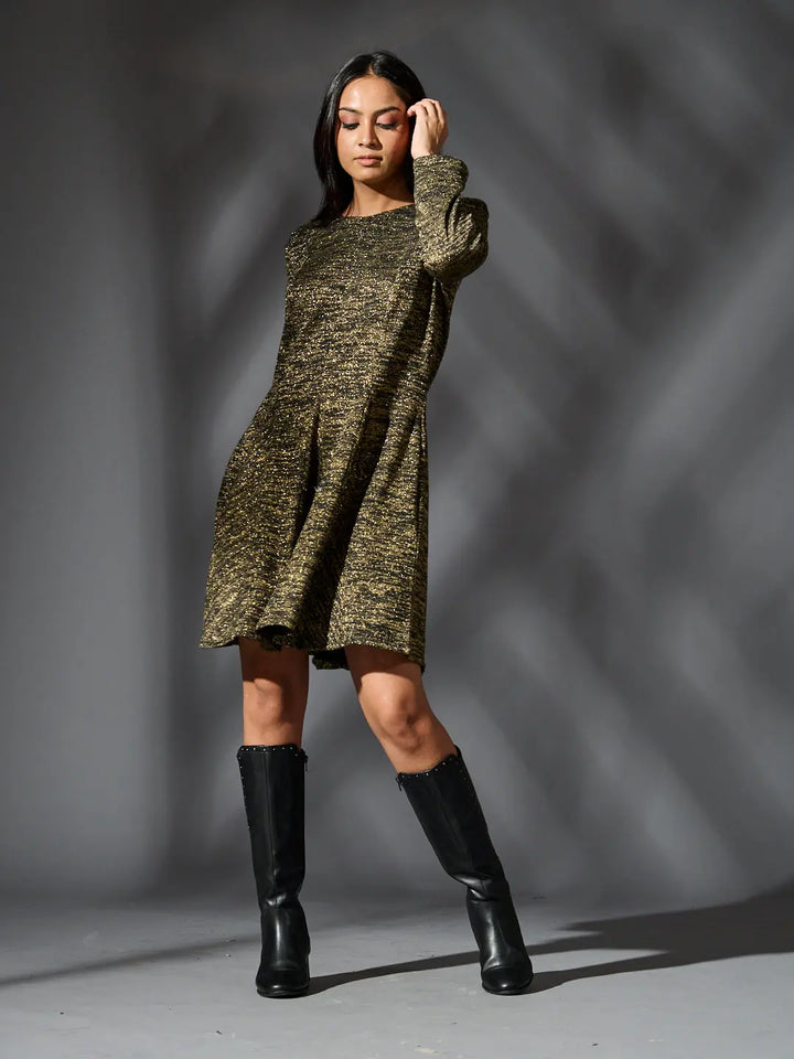 Risate golden knit glam dress with a stylish cut, perfect for fashionable outings and special occasions