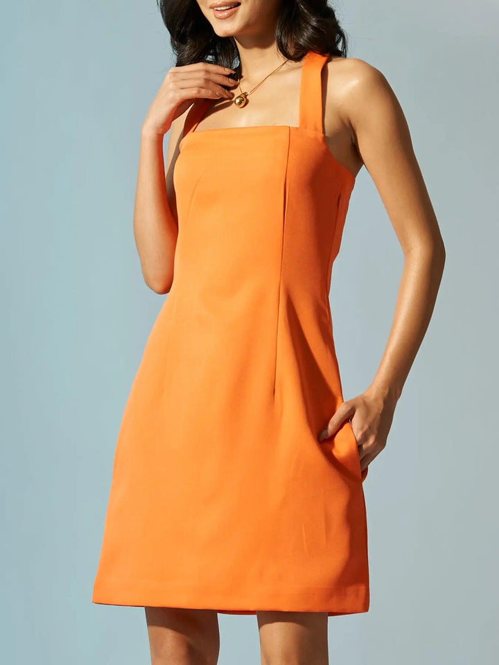 Risate halterneck crepe mini dress in bright orange with stylish square neckline and pockets