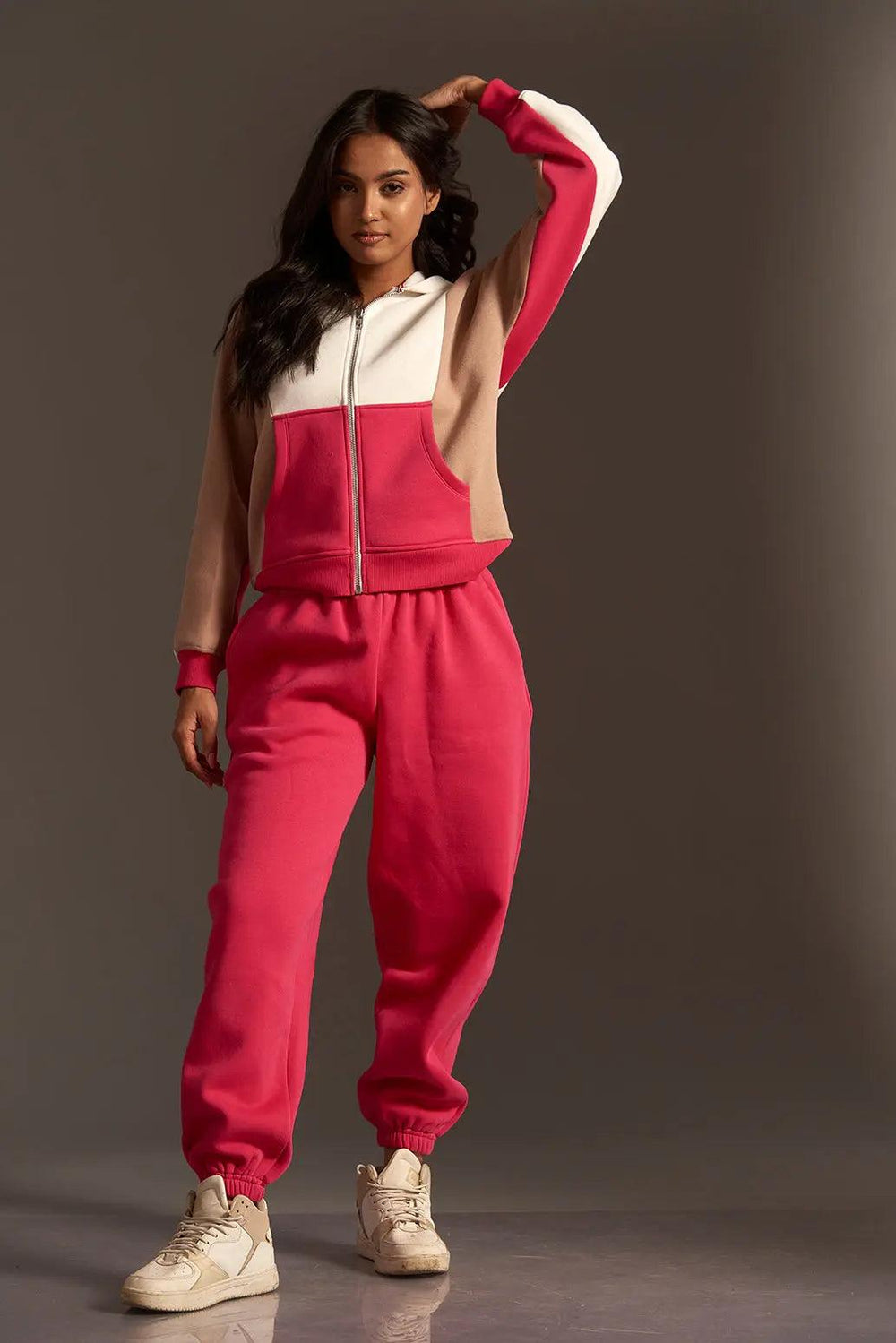 Risate hooded sweatshirt zip up in pink and beige color block design with front zipper and matching pants