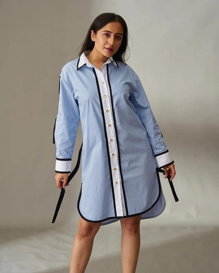 Risate Impressionist cotton shirt dress in blue with contrasting black trim and buttons