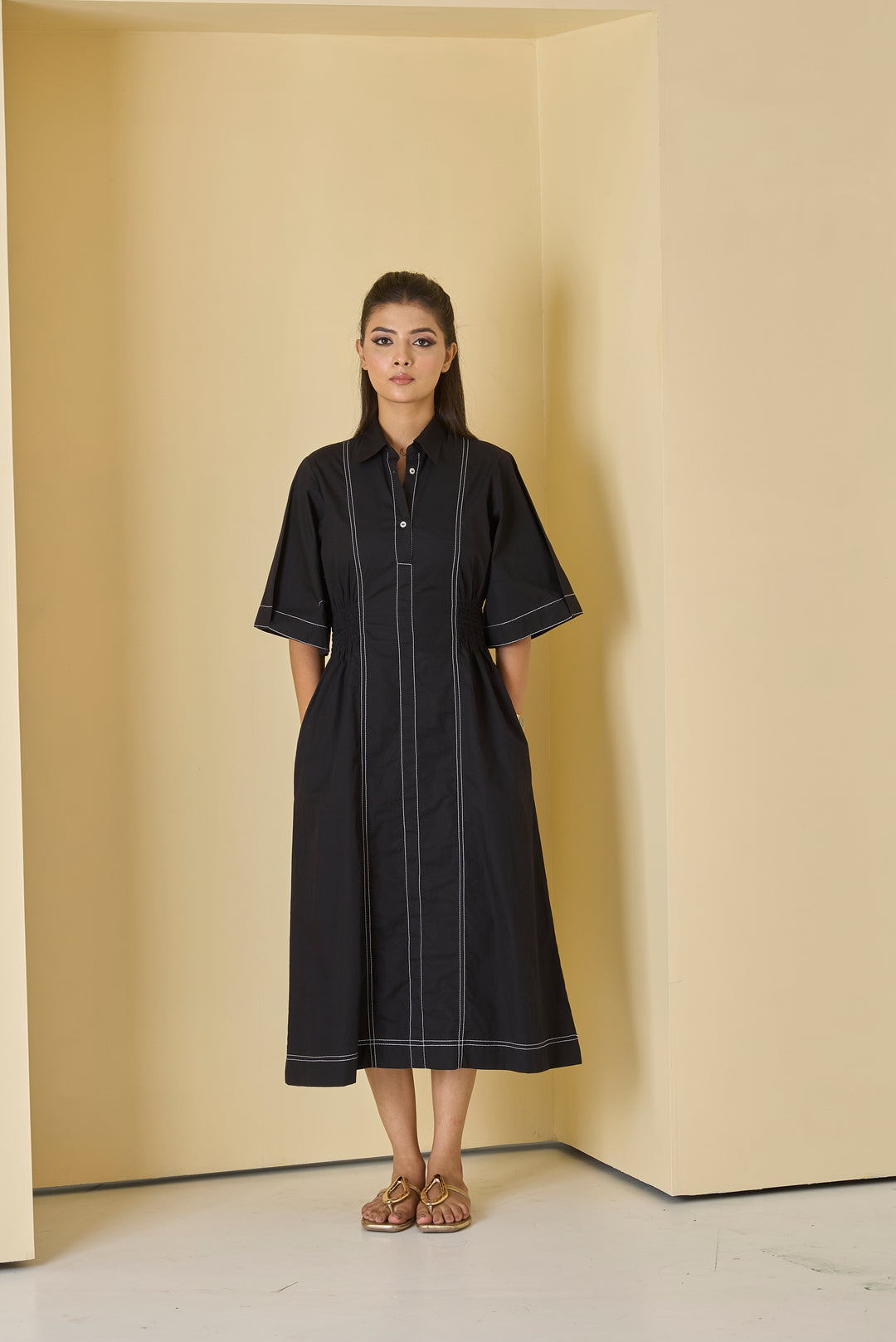 Risate Inka top stitch midi dress in black with short sleeves and side pockets
