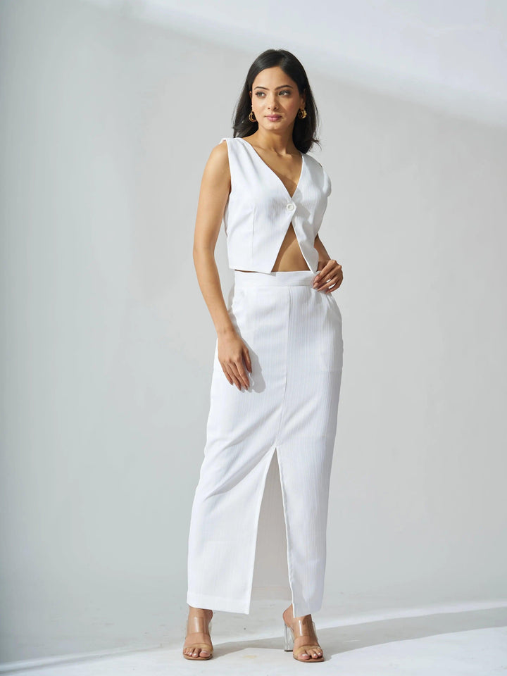 Ivory cutout co-ord set for women featuring a sleeveless top and a stylish skirt with a slit