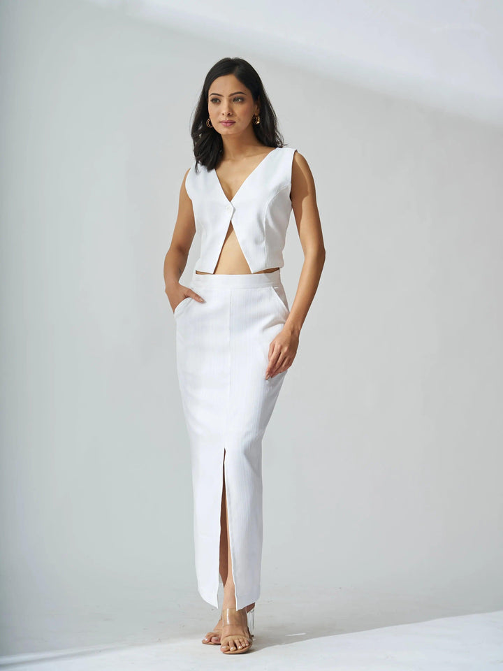 Risate ivory cutout co-ord set for women featuring a cropped top and high-slit skirt