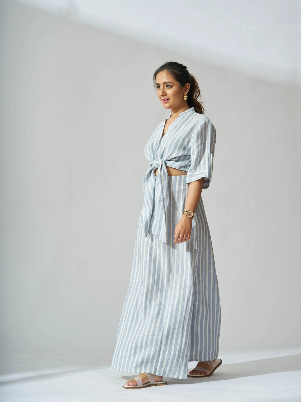 Stylish Risate linen co-ord set for women in blue and white stripes, perfect for warm weather outings