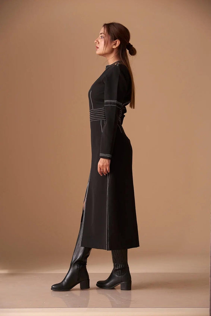 Elegant long sleeve mock neck dress for women in black with stylish side slits and fitted silhouette