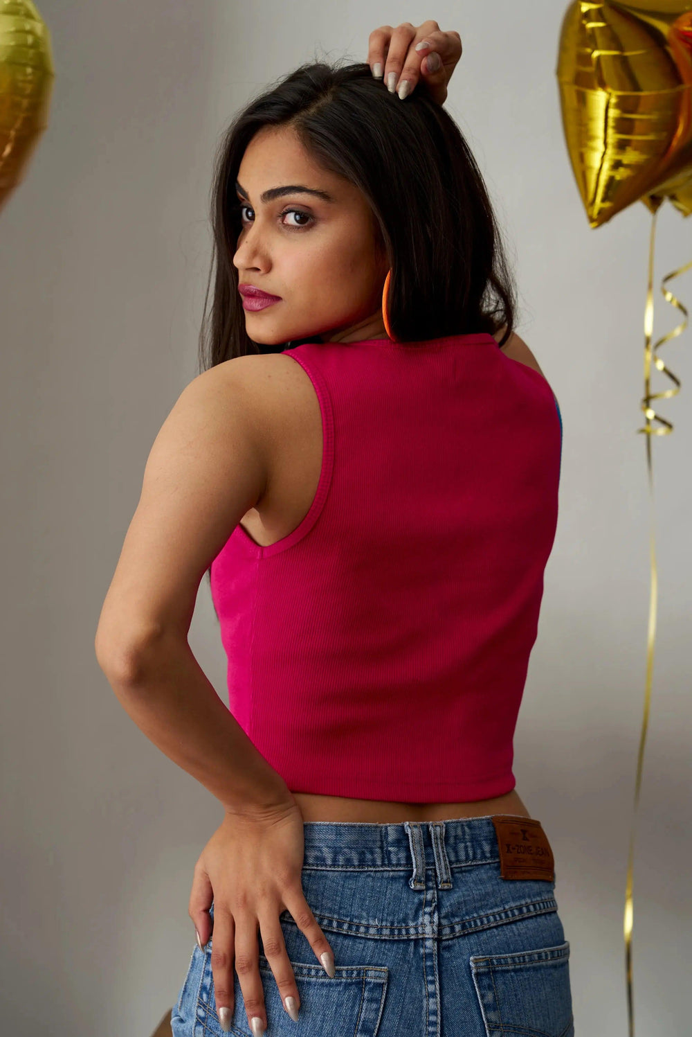 Risate Mia crop top for women in pink with a stylish back design, perfect for casual outings