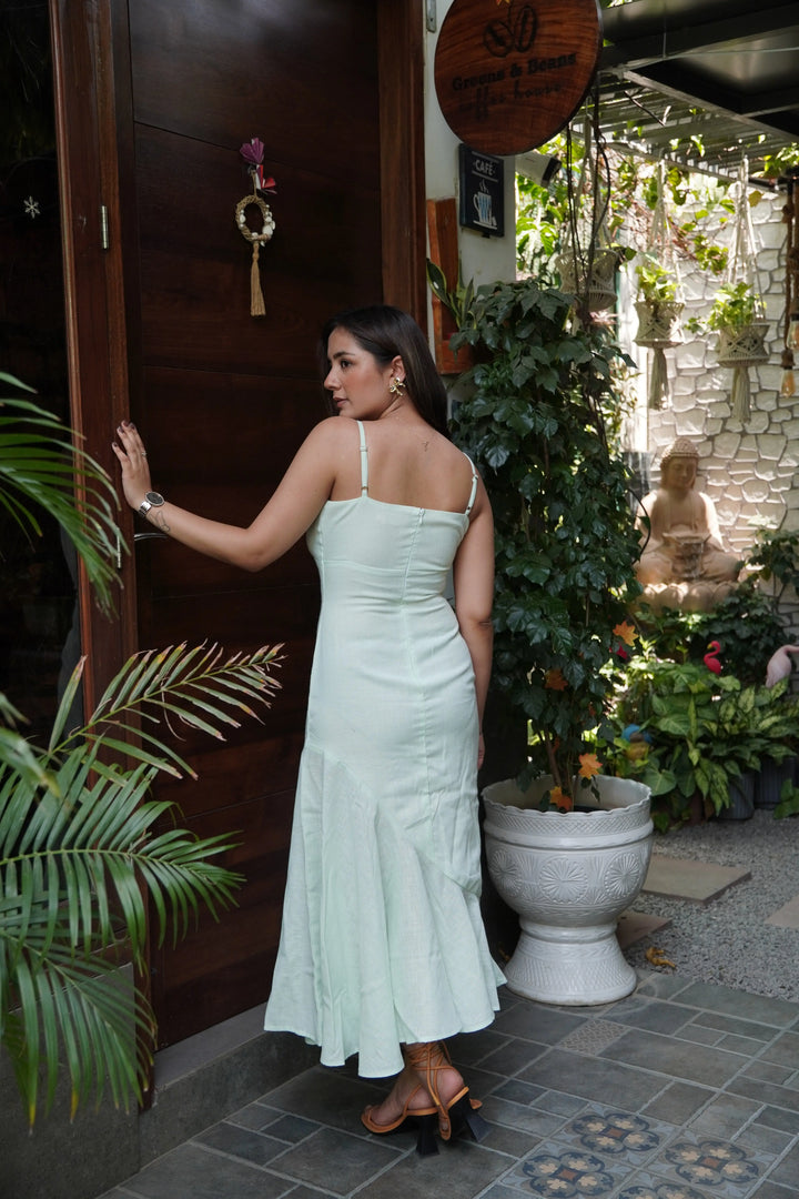 Mint green western dress with a flattering fit and flared hem, perfect for casual outings