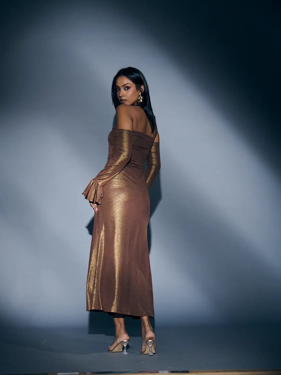 Risate mocha shimmer bodycon dress featuring off-the-shoulder style and flared sleeves for a chic look