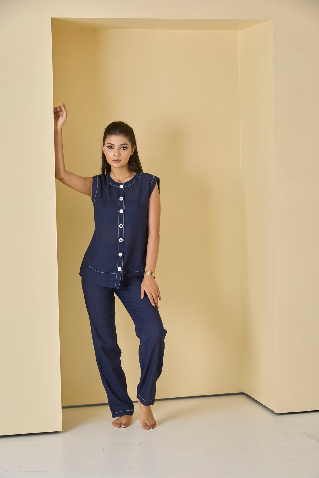 Navy linen co-ord set for women featuring a short-sleeve top and matching trousers in a stylish design